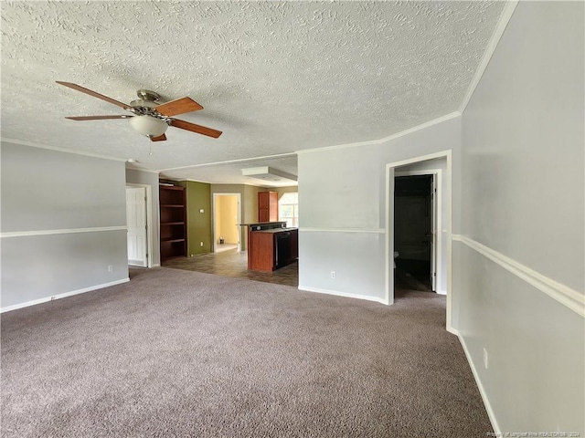 unfurnished living room featuring ceiling fan, dark carpet, and a textured ceiling