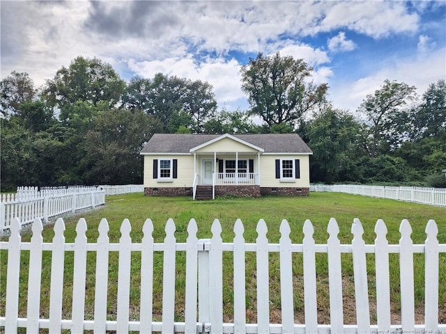 view of front of house featuring a porch and a front yard