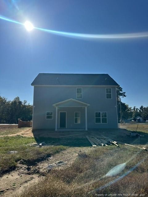 view of front of house with a patio area