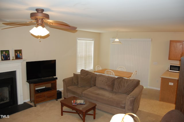 living room featuring ceiling fan