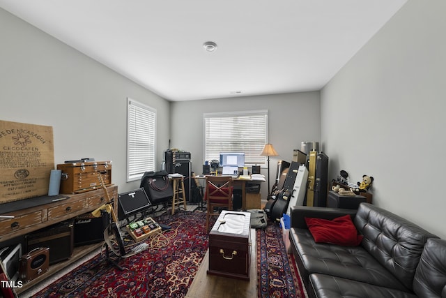 office space featuring dark wood-type flooring