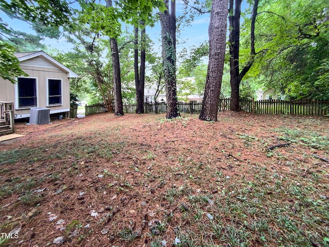 view of yard featuring central AC