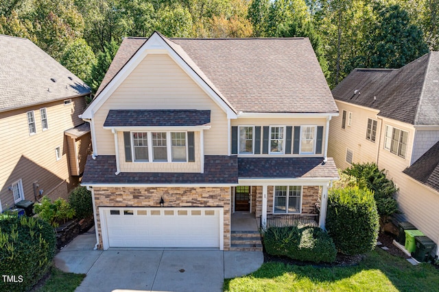 view of front of property featuring a garage