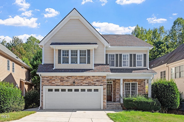 front of property with a garage