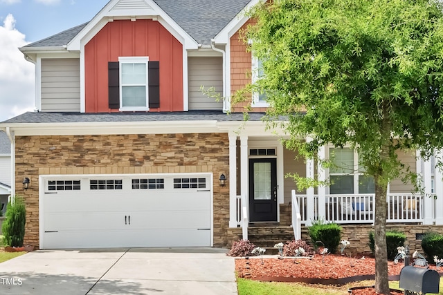 craftsman-style house featuring a garage and covered porch