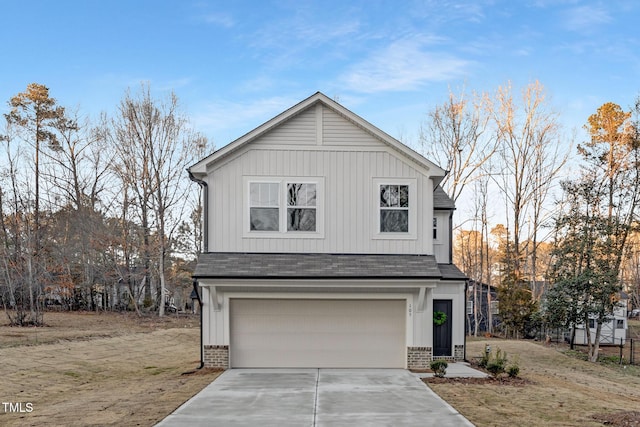 view of front of property with a garage