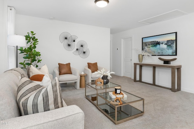 living room featuring light carpet