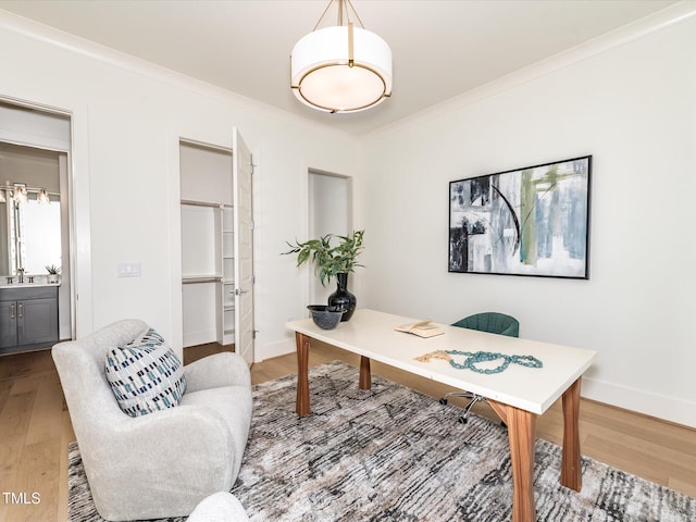 144 W Beech Slope Ct, Chapel Hill, NC 27517 - office area featuring crown molding, baseboards, and wood finished floors