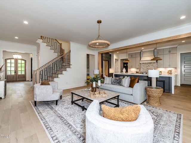 144 W Beech Slope Ct, Chapel Hill, NC 27517 - living area with light wood-type flooring, recessed lighting, and stairway