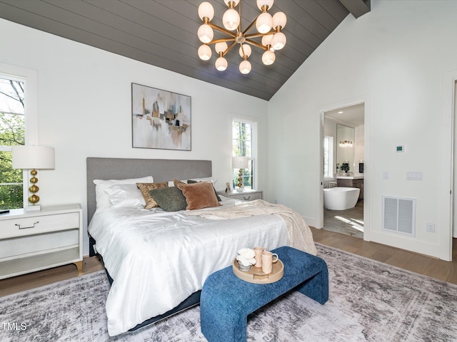 144 W Beech Slope Ct, Chapel Hill, NC 27517 - bedroom with connected bathroom, an inviting chandelier, wooden ceiling, wood finished floors, and visible vents