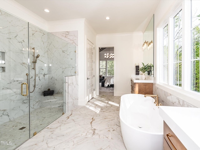 144 W Beech Slope Ct, Chapel Hill, NC 27517 - full bathroom featuring a freestanding bath, vanity, marble finish floor, a marble finish shower, and ensuite bathroom