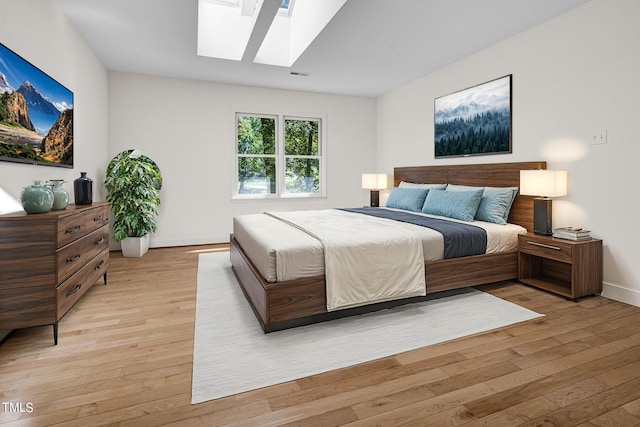 bedroom with light wood-type flooring