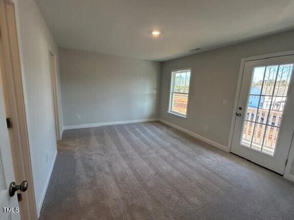 view of carpeted spare room