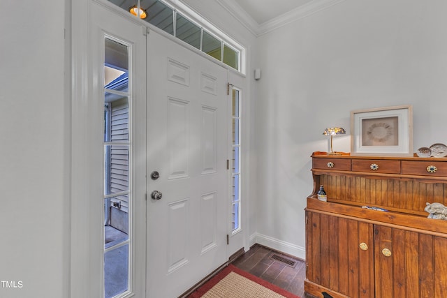 foyer featuring crown molding and dark hardwood / wood-style flooring