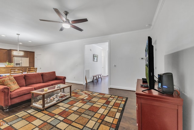 living room featuring ceiling fan, crown molding, and dark hardwood / wood-style flooring