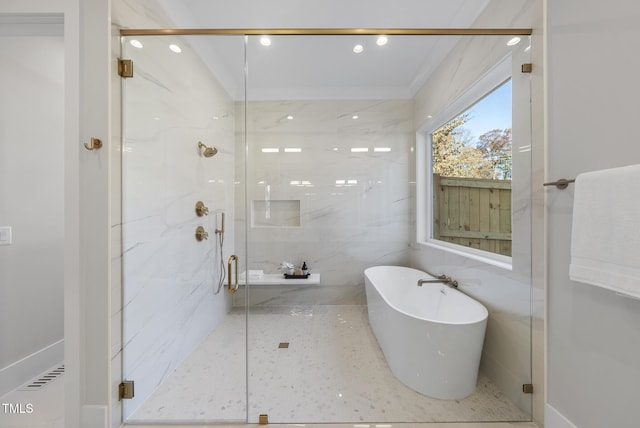 701 Dartmouth Rd, Raleigh, NC 27609 - bathroom featuring a freestanding tub, a marble finish shower, and recessed lighting