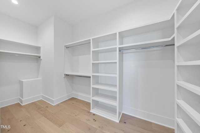701 Dartmouth Rd, Raleigh, NC 27609 - walk in closet featuring wood finished floors