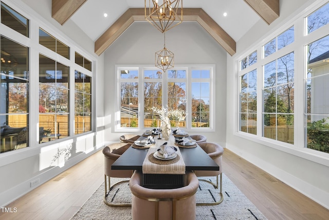 701 Dartmouth Rd, Raleigh, NC 27609 - sunroom featuring a chandelier