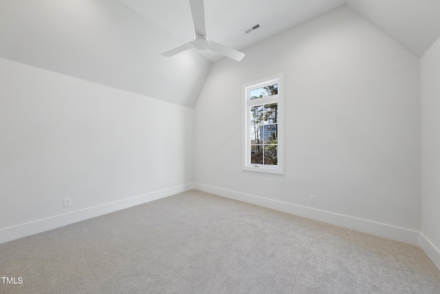 701 Dartmouth Rd, Raleigh, NC 27609 - bonus room with vaulted ceiling, light carpet, ceiling fan, and baseboards