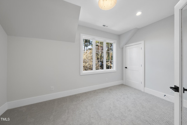 701 Dartmouth Rd, Raleigh, NC 27609 - unfurnished bedroom with carpet floors, baseboards, vaulted ceiling, and recessed lighting