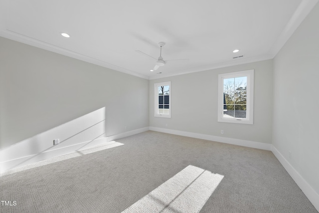 701 Dartmouth Rd, Raleigh, NC 27609 - unfurnished room with recessed lighting, baseboards, crown molding, ceiling fan, and light carpet