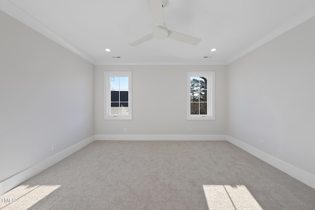 701 Dartmouth Rd, Raleigh, NC 27609 - unfurnished room with crown molding, a ceiling fan, recessed lighting, baseboards, and light colored carpet