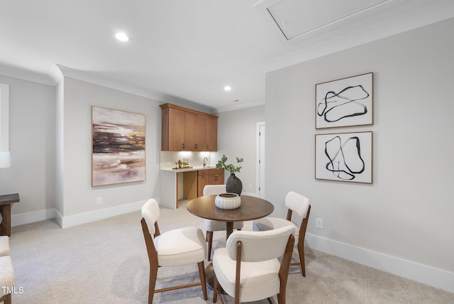 701 Dartmouth Rd, Raleigh, NC 27609 - dining room with crown molding, light carpet, baseboards, attic access, and recessed lighting