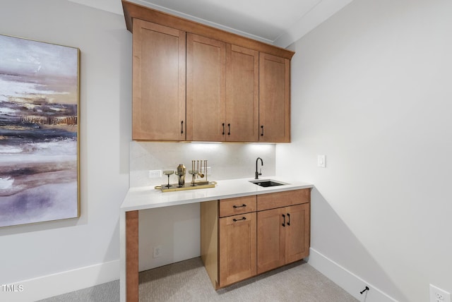701 Dartmouth Rd, Raleigh, NC 27609 - indoor wet bar with baseboards and light carpet