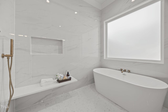 701 Dartmouth Rd, Raleigh, NC 27609 - bathroom with a freestanding tub and speckle patterned floor