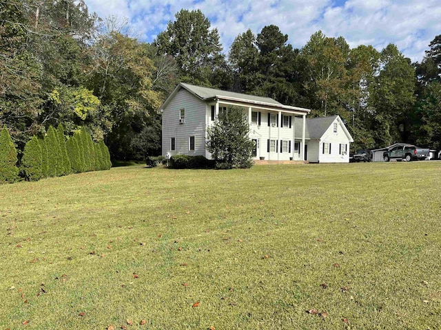 view of front of home featuring a front lawn