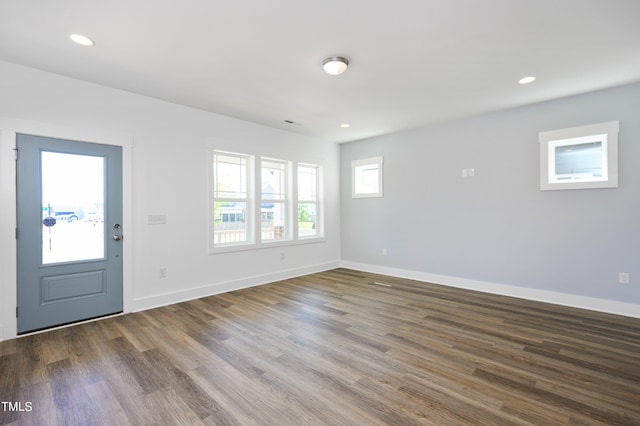 interior space with dark hardwood / wood-style floors