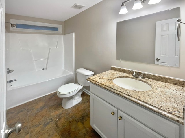 full bathroom with bathtub / shower combination, vanity, and toilet