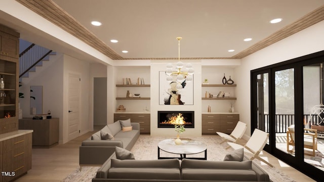 living room with an inviting chandelier, ornamental molding, built in features, and light wood-type flooring