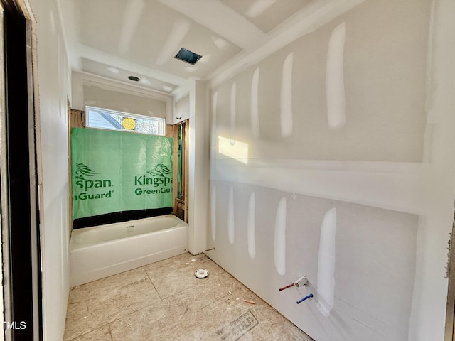 bathroom featuring a washtub