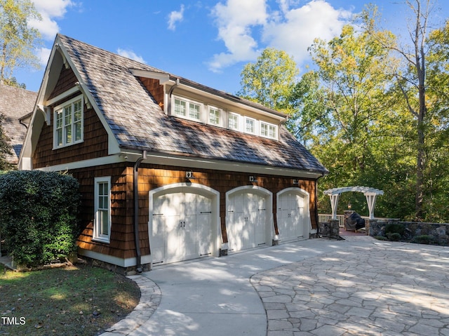 exterior space with a garage