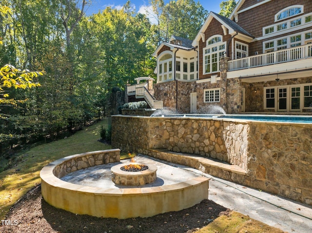 3105 Cone Manor Ln, Raleigh, NC 27613 - view of pool featuring a fire pit, stairs, a patio area, and a deck