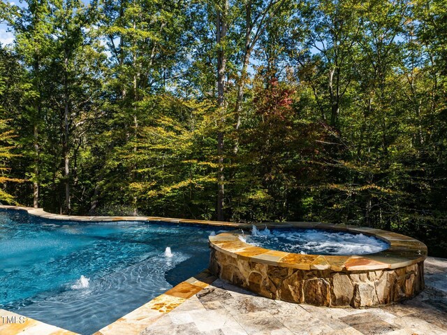 3105 Cone Manor Ln, Raleigh, NC 27613 - view of swimming pool with a pool with connected hot tub