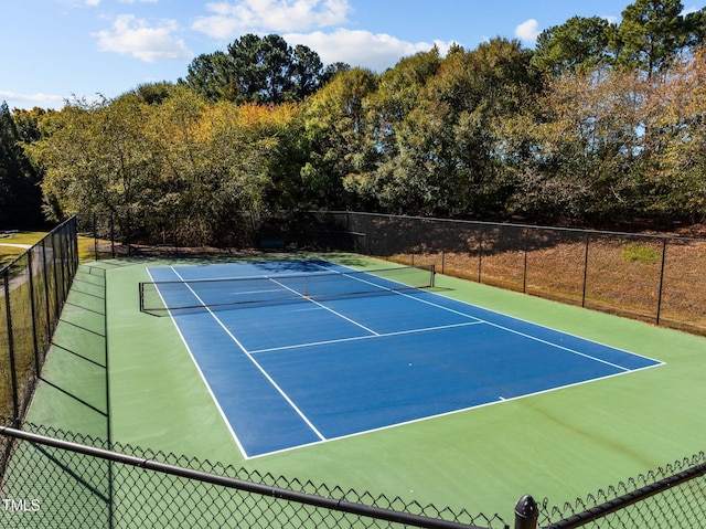 view of tennis court featuring basketball court