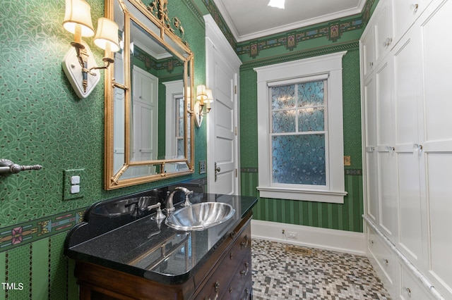 3105 Cone Manor Ln, Raleigh, NC 27613 - bathroom with wallpapered walls, vanity, crown molding, and tile patterned floors