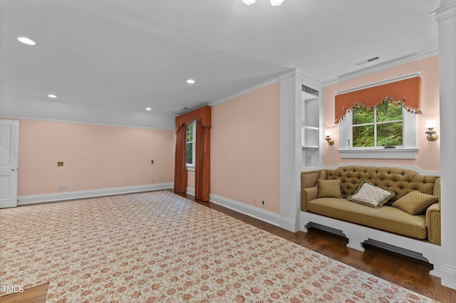 3105 Cone Manor Ln, Raleigh, NC 27613 - sitting room with ornamental molding, wood finished floors, and recessed lighting