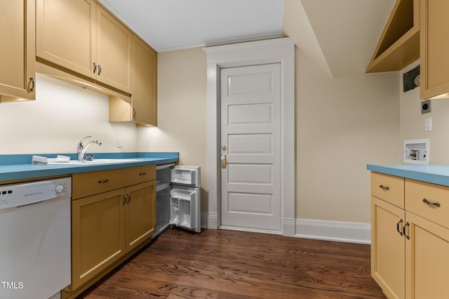 3105 Cone Manor Ln, Raleigh, NC 27613 - kitchen featuring dishwasher, dark wood-type flooring, and light countertops