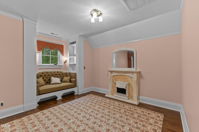 3105 Cone Manor Ln, Raleigh, NC 27613 - unfurnished living room with wood finished floors, crown molding, a premium fireplace, and lofted ceiling