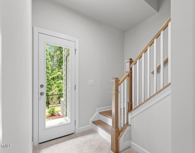 4505 Mint Leaf Ln, Raleigh, NC 27612 - carpeted foyer featuring stairs and baseboards