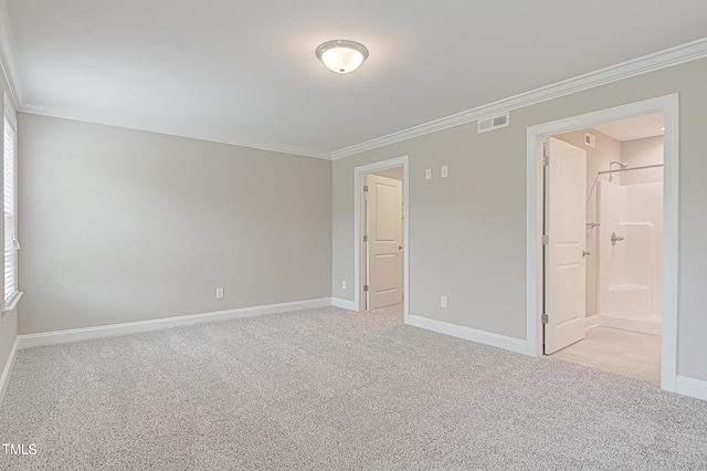 unfurnished bedroom with connected bathroom, ornamental molding, and light carpet