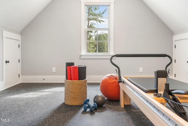 workout area featuring lofted ceiling