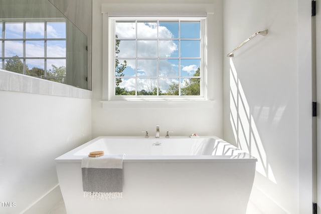 bathroom featuring a bath