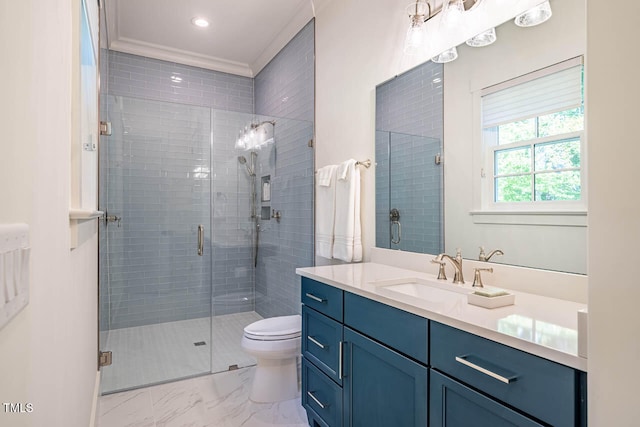 bathroom featuring vanity, ornamental molding, walk in shower, and toilet