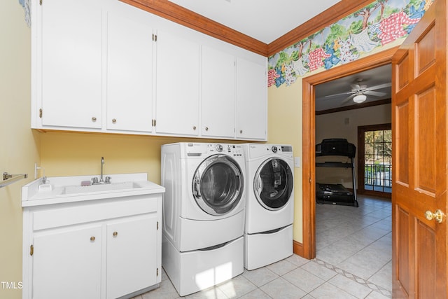 clothes washing area featuring cabinets, light tile patterned floors, ceiling fan, separate washer and dryer, and sink