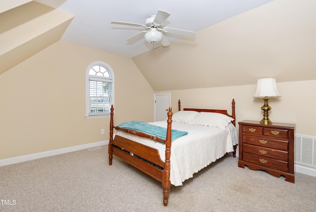 carpeted bedroom featuring vaulted ceiling and ceiling fan