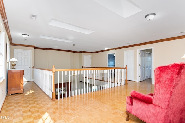 hallway featuring crown molding, light parquet flooring, and a skylight